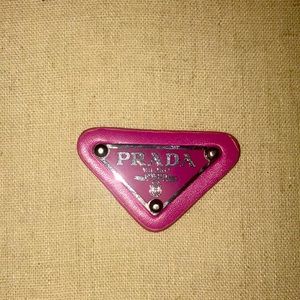 Prada logo pink. Save from a Prada bag.